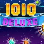 青い背景に「1010 DELUXE」と色とりどりの宝石が描かれているイラスト。