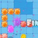 青いグリッド上にオレンジと赤の宝石ブロックと「FINE!