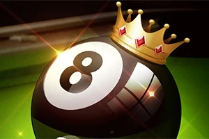 ビリヤードの8番ボールの上に金色の王冠が載っている画像。