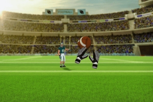 アメフトのフィールドで選手がボールをキャッチしようとしている。