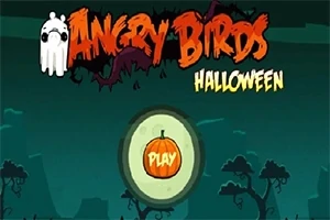 ハロウィンのテーマを持つ森の背景に、オレンジ色のカボチャの「PLAY」ボタンがあります。
