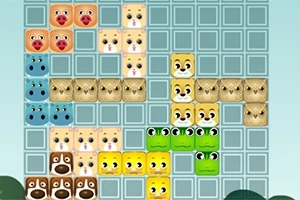 動物の顔が描かれたカラフルなブロックが、グリッド上に配置されている。