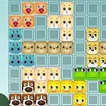 動物の顔が描かれたカラフルなブロックが、グリッド上に配置されている。