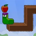 緑色のキャラクターがリンゴを頭に乗せ、茶色のブロック状の道を進んでいる。