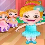 バレリーナの衣装を着た女の子たちがダンススタジオで笑顔を見せている。