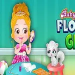 ティアラを着けた金髪の女の子が鏡を持ちながら座り、隣に白い子猫がいる。
