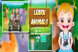 かわいい女の子が笑顔でカメラを首にかけ、隣には車に乗った動物たちと「LEARN ANIMALS」と書かれたボードがある。