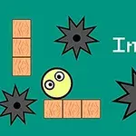 緑色の背景に、黄色いボール、レンガのブロック、黒いトゲ付き球体が配置されている。