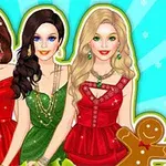 3人の女性がクリスマス風の衣装を着てポーズをとっている。
