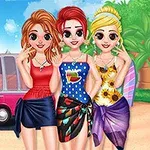 3人の女性がビーチでサマードレスを着て笑顔でポーズをとり、その後ろにはピンク色のバンがある。