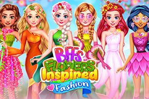 色とりどりのドレスを着た5人の女性たちが、花のアクセサリーを身に付け並んで微笑んでいる。