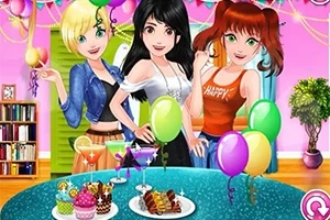 カラフルな風船とスイーツが並ぶテーブルを囲む3人の女性。