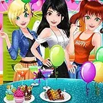 カラフルな風船とスイーツが並ぶテーブルを囲む3人の女性。