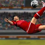 赤いユニフォームのサッカー選手がオーバーヘッドキックをしている。