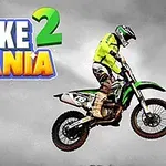 オートバイに乗ったライダーが空中でジャンプしている画像。