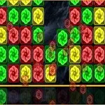 赤、緑、黄色の花の模様が付いたカラフルなブロックが並んでいる画像。