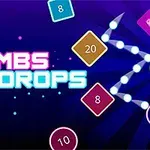 カラフルな数字付きの図形と「BOMBS DROPS」のテキストが青い背景に配置されている画像。