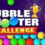 カラフルなバブルとトロフィーのイラストが描かれた「BUBBLE SHOOTER CHALLENGE」のロゴ。