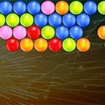 カラフルなボールが複数並んでいる画像で、背景に線のパターンが描かれています。