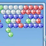 青、緑、白、赤のカラフルな球が格子状に並んでいる画像。