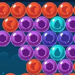 青い背景に、赤、紫、青のボールが並んでいるイラスト。