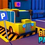 黄色いバスが駐車場に停まっており、近くに「P」の標識があるカラフルな街並み。