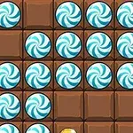 水色の渦巻きキャンディとチョコレートタイルのパズルグリッド。