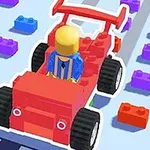 赤いブロックで作られた車に乗る黄色いキャラクターと周囲に散らばる色とりどりのブロック。