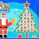 サンタクロースがプレゼントを持っており、クリスマスツリーにはさまざまな模様のタイルが飾られているイラスト。