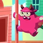 ピンク色の角が生えたキャラクターが建物の間を飛び跳ねている様子。