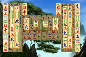 青空と木々を背景に、積み重なった麻雀牌のセット。