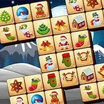 クリスマスをテーマにしたパネルが並べられた冬の夜の背景。