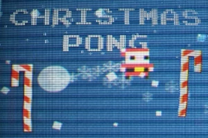 青い背景に、サンタクロースとキャンディケーンが描かれており、「CHRISTMAS PONG」の文字が表示されています。