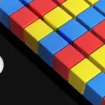 色とりどりのブロックの列に向かって進む白いボール。