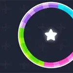 暗い背景に、中央の白い星と円形に配置された色とりどりのセグメントが描かれた輪。