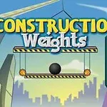 青空を背景に、建設現場に吊るされた黒いボールと英語のテキスト。