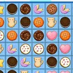 カラフルなクッキーや星、ハート、ネコの形をしたアイテムが並んでいるグリッド。