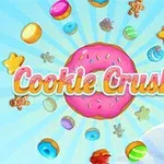 ピンクのドーナツを中心に、カラフルなクッキーやキャンディが空中に散らばっているイラスト。