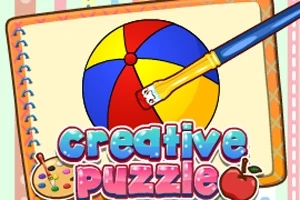 ノートに描かれたカラフルなボールを絵筆で塗っているイラストと「creative puzzle」の文字。