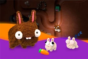 茶色のモフモフしたウサギと白いウサギたちが、紫とオレンジの背景の上にいて、ニンジンが置かれている。