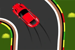 赤い車が曲がりくねった道路を走行している様子。