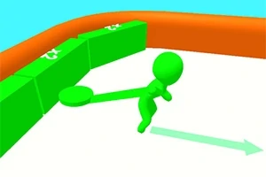 緑色のキャラクターがオレンジ色の縁の中で緑色のブロックにラケットを振っている。