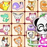 かわいい動物のイラストが描かれたタイルが並ぶパズルゲームの画面とピンクの水玉柄のエプロンを着たパンダ。