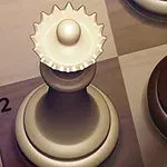 チェス盤の上に並んだ白と黒のチェス駒のクローズアップ。