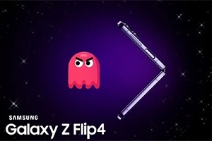 紫色の背景に、怒った表情の赤いキャラクターと開いた状態のSamsung Galaxy Z Flip4が浮かんでいる。