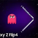 紫色の背景に、怒った表情の赤いキャラクターと開いた状態のSamsung Galaxy Z Flip4が浮かんでいる。