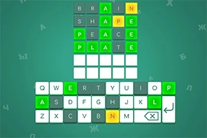 緑と黄色の文字が並んだ単語パズル画面とキーボードの配置。