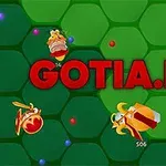 緑の六角形の背景に、中央に赤い文字で「GOTIA