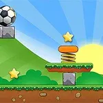 緑の丘の上にサッカーボール、爆弾、星があり、ゴールとジャンプ台がある風景。