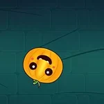 青いタイルの背景に浮かぶ笑顔のカボチャのイラスト。